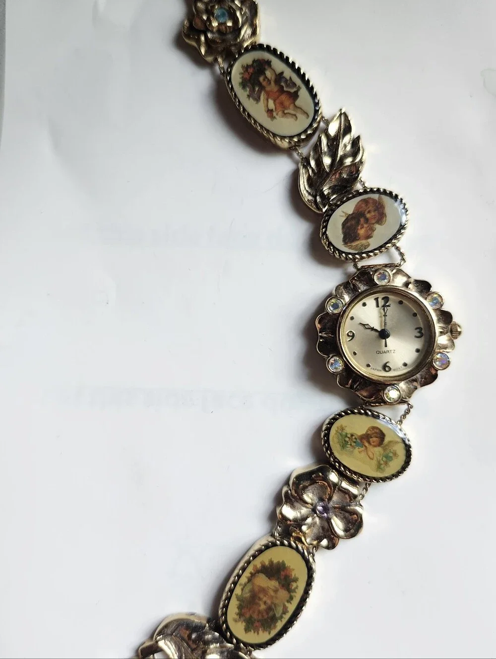 Vintage Gold Tone Floral Bracelet Watch with Cherub Medallions